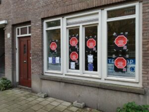 Bewoners Woestduinstraat voeren actie